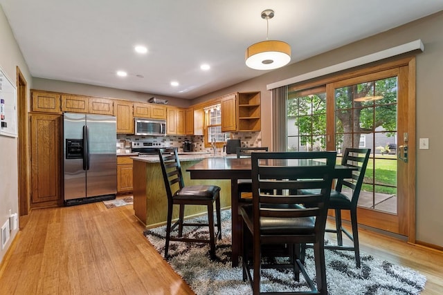 16503 Biscayne Blvd, Eden Prairie, MN 55347 - dining area featuring light wood-style floors and recessed lighting
