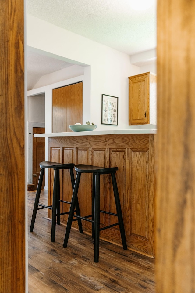 784 Fairview Ave N, Saint Paul, MN 55104 - bar with dark wood-style floors