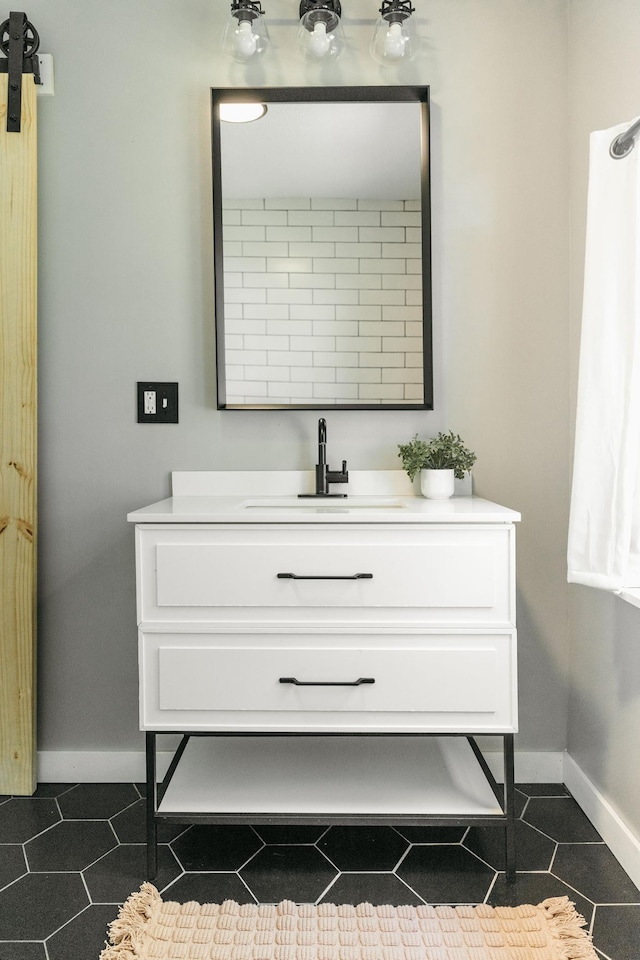 784 Fairview Ave N, Saint Paul, MN 55104 - bathroom featuring vanity and tile patterned flooring