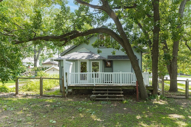 784 Fairview Ave N, Saint Paul, MN 55104 - view of front facade featuring a deck and roof with shingles
