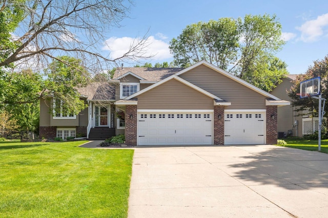 2174 Ponds Way, Shakopee, MN 55379 - view of front facade featuring brick siding, a garage, and a front yard