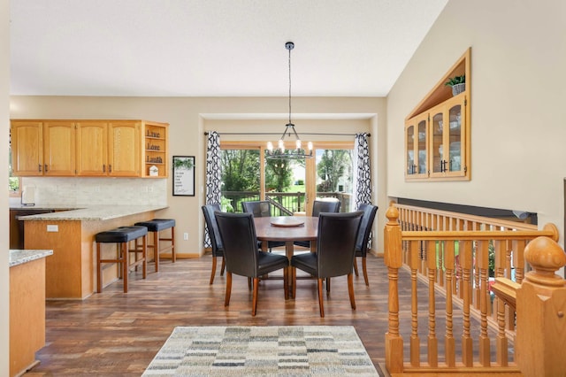2174 Ponds Way, Shakopee, MN 55379 - dining area with a chandelier and dark wood-style flooring
