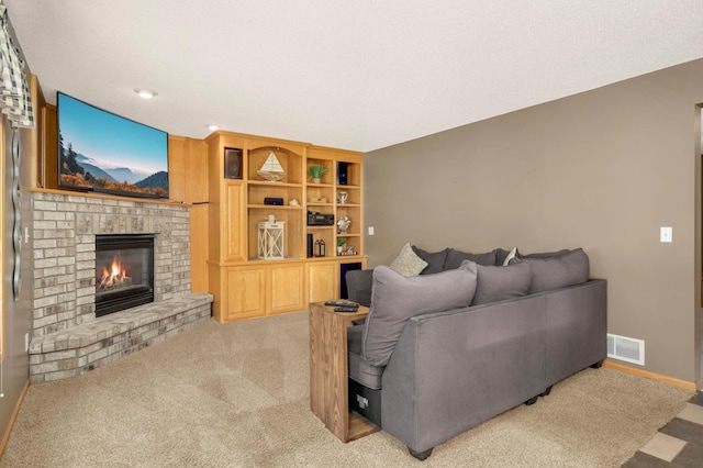2174 Ponds Way, Shakopee, MN 55379 - carpeted living room featuring a fireplace and baseboards