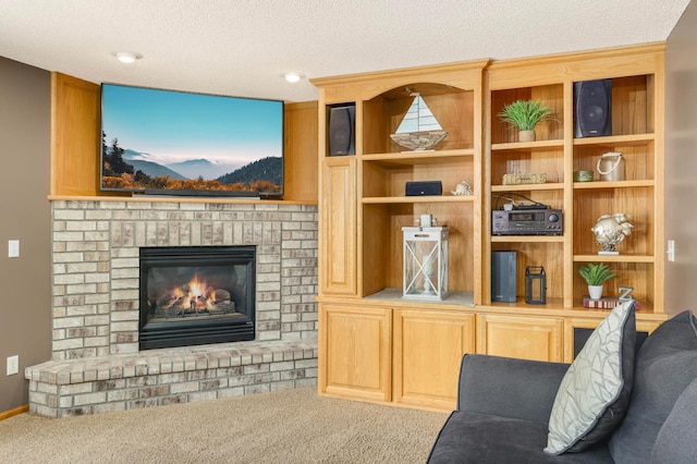 2174 Ponds Way, Shakopee, MN 55379 - living room featuring carpet floors, a fireplace, and a textured ceiling