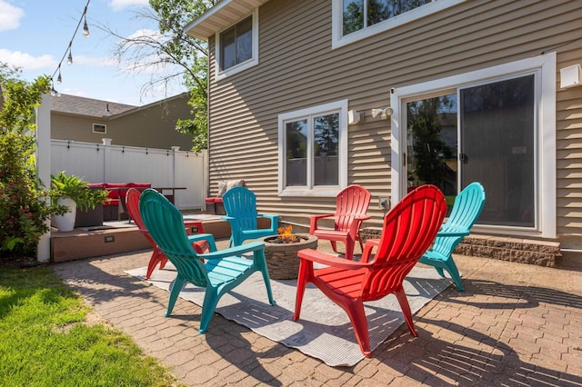 2174 Ponds Way, Shakopee, MN 55379 - view of patio / terrace featuring an outdoor fire pit