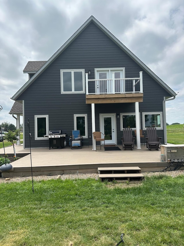 19 Sandbar Rd, Tracy, MN 56175 - rear view of property with a balcony and a yard