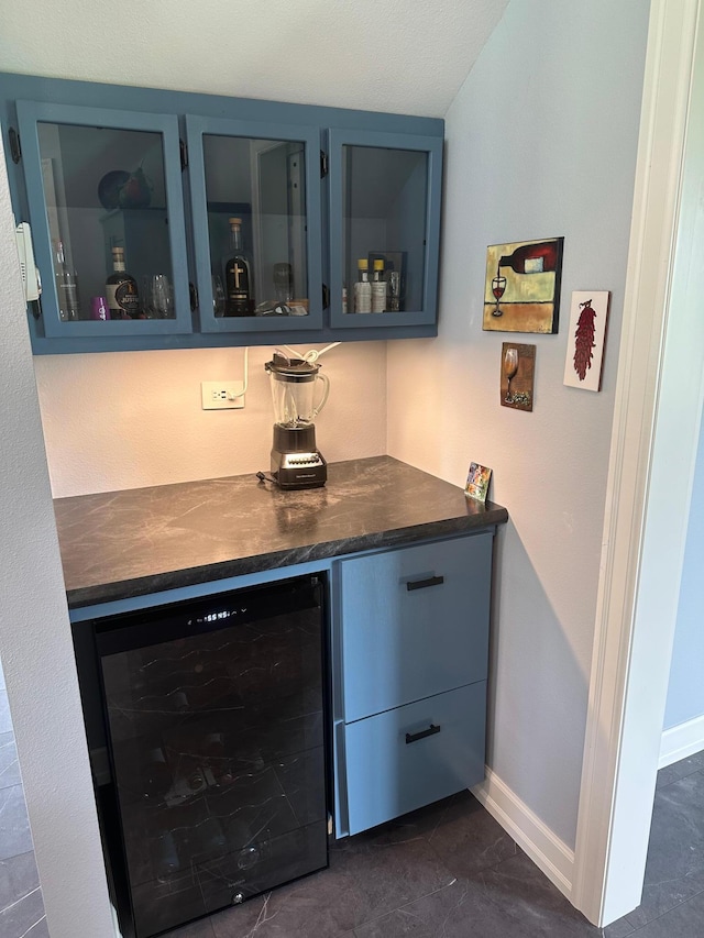 19 Sandbar Rd, Tracy, MN 56175 - indoor dry bar featuring wine cooler and baseboards