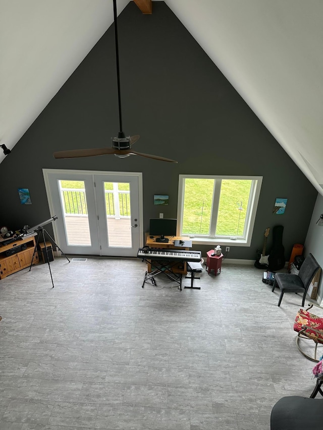 19 Sandbar Rd, Tracy, MN 56175 - living room featuring plenty of natural light, a ceiling fan, french doors, and high vaulted ceiling