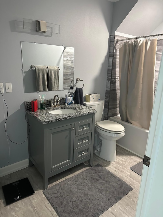 19 Sandbar Rd, Tracy, MN 56175 - bathroom featuring wood finished floors, vanity, and shower / tub combo with curtain