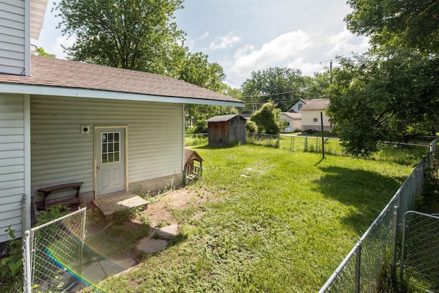 610 2nd St SW, Wadena, MN 56482 - fenced backyard featuring a storage unit