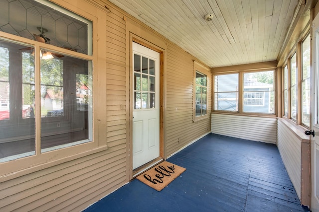 610 2nd St SW, Wadena, MN 56482 - unfurnished sunroom featuring ceiling fan