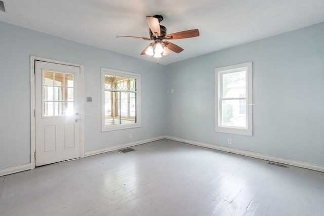 610 2nd St SW, Wadena, MN 56482 - empty room with wood finished floors and a ceiling fan