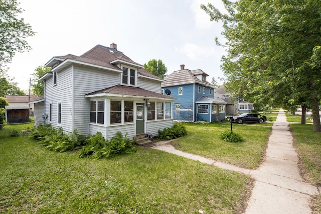 610 2nd St SW, Wadena, MN 56482 - view of front of property with entry steps, roof with shingles, and a front yard