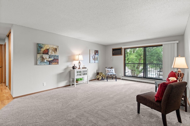 4 Pine Tree Dr Unit 218, Arden Hills, MN 55112 - living area featuring light colored carpet, a wall unit AC, a textured ceiling, and a baseboard heating unit