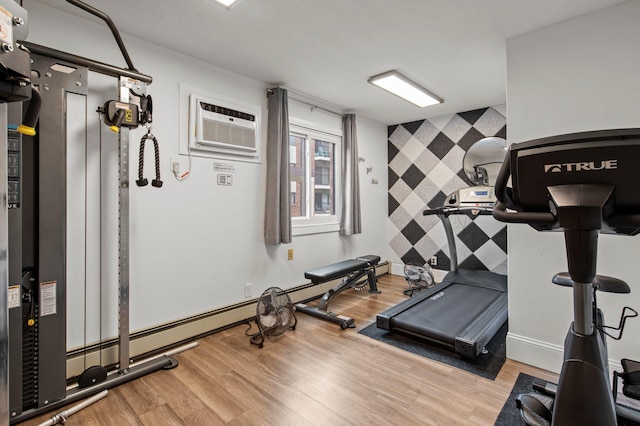 4 Pine Tree Dr Unit 218, Arden Hills, MN 55112 - exercise room featuring an accent wall, a wall unit AC, and wood finished floors