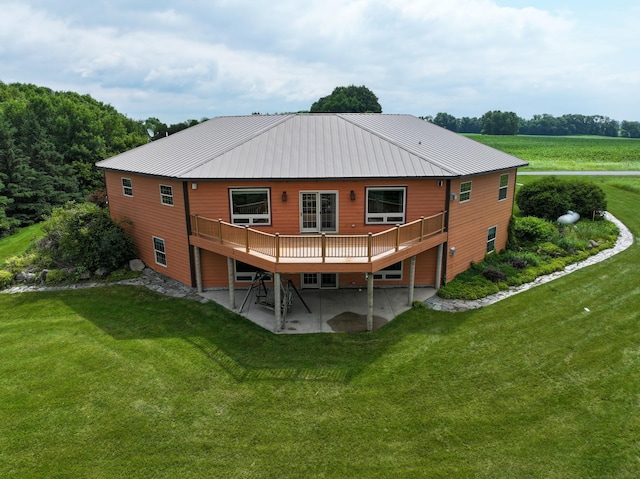 360 Karens Way NW, Alexandria, MN 56308 - rear view of property with a patio, a deck, and a lawn