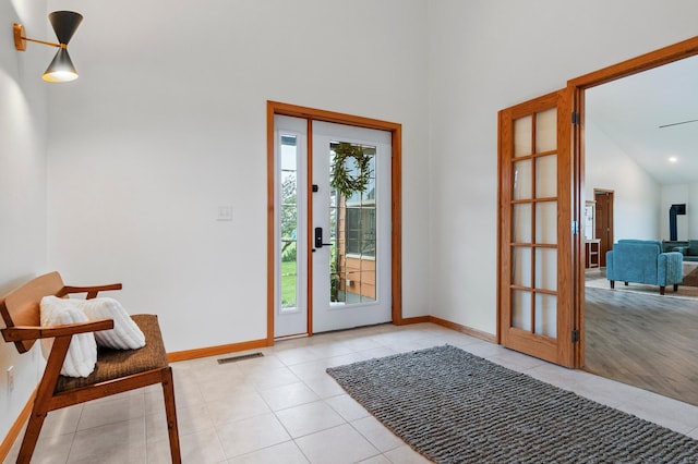 360 Karens Way NW, Alexandria, MN 56308 - foyer entrance featuring light tile patterned floors and high vaulted ceiling