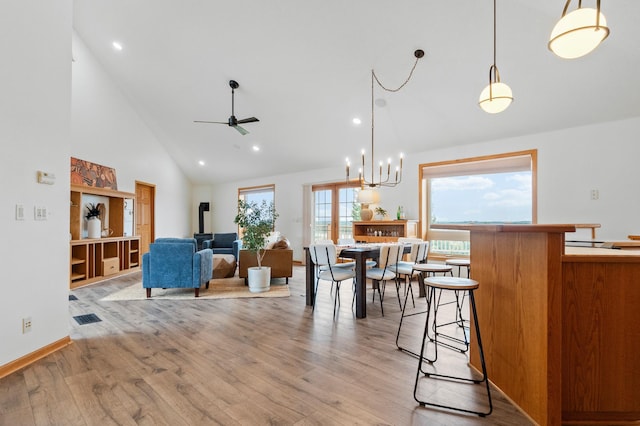 360 Karens Way NW, Alexandria, MN 56308 - dining area with high vaulted ceiling, ceiling fan, light wood-style flooring, and recessed lighting