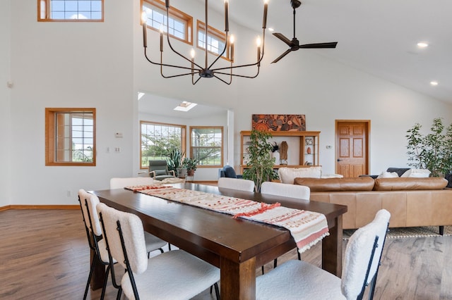 360 Karens Way NW, Alexandria, MN 56308 - dining space featuring high vaulted ceiling, wood finished floors, recessed lighting, and a chandelier