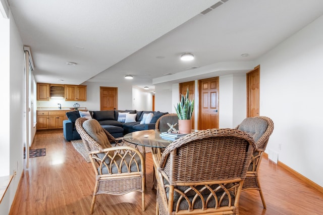 360 Karens Way NW, Alexandria, MN 56308 - dining room featuring light wood finished floors and baseboards