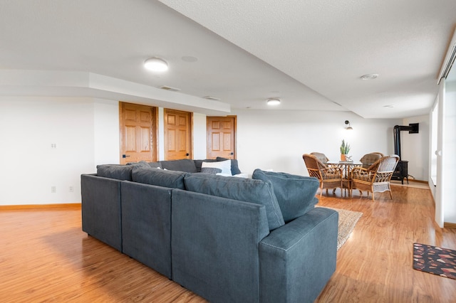 360 Karens Way NW, Alexandria, MN 56308 - living area featuring light wood-style flooring and baseboards