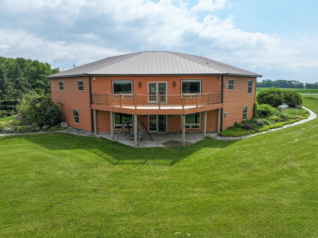 360 Karens Way NW, Alexandria, MN 56308 - back of property with a patio, a lawn, and a deck