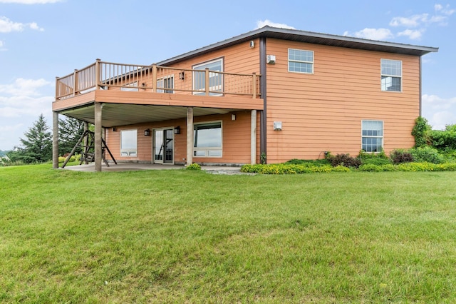 360 Karens Way NW, Alexandria, MN 56308 - rear view of property featuring a yard, a patio area, and a wooden deck