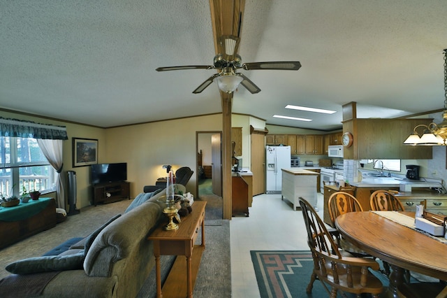 30348 422nd Ln, Aitkin, MN 56431 - living area featuring light floors, a ceiling fan, a textured ceiling, and lofted ceiling