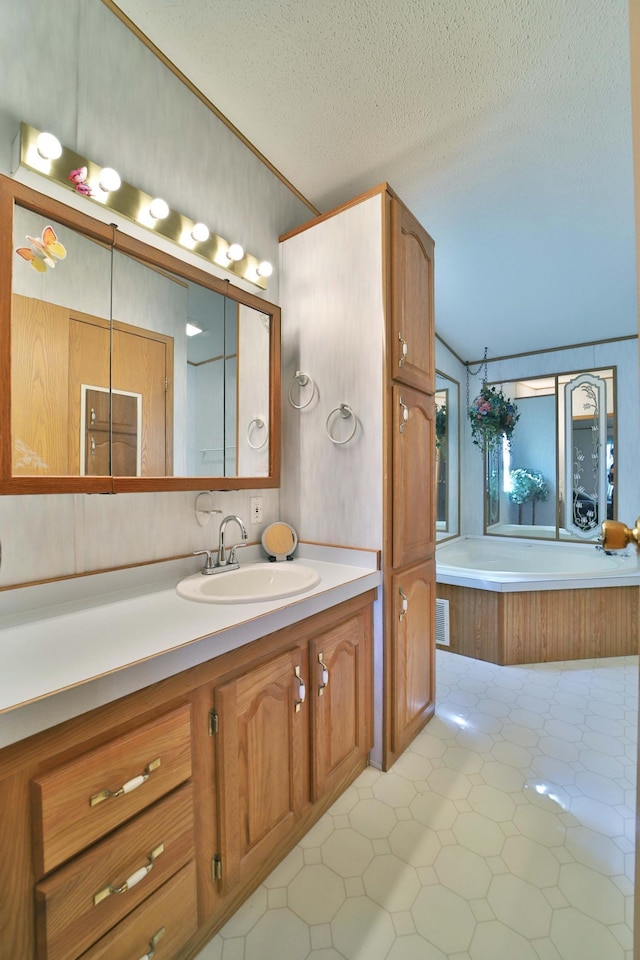 30348 422nd Ln, Aitkin, MN 56431 - bathroom featuring vanity, a garden tub, a textured ceiling, lofted ceiling, and tile patterned floors