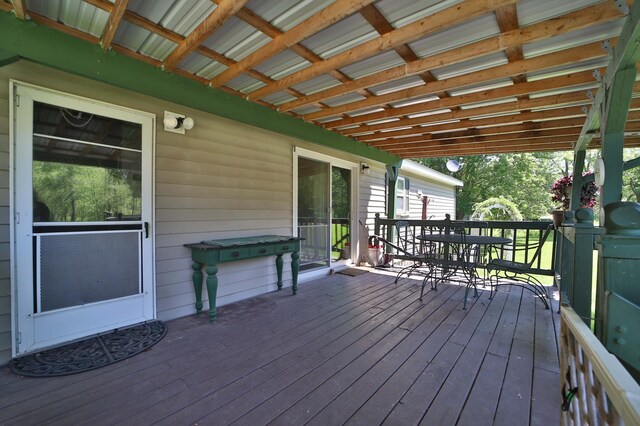 30348 422nd Ln, Aitkin, MN 56431 - wooden deck featuring outdoor dining area