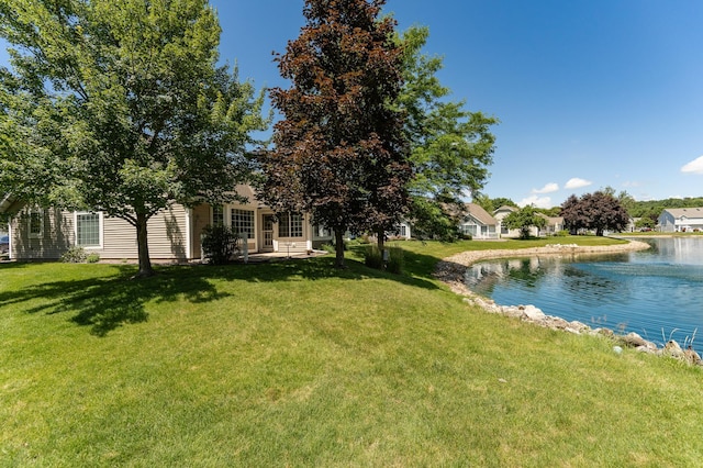 1954 Topaz Pointe Ln SW, Rochester, MN 55902 - view of grassy yard featuring a water view