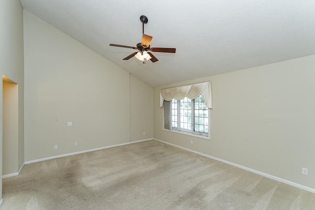 1954 Topaz Pointe Ln SW, Rochester, MN 55902 - unfurnished room featuring vaulted ceiling, a ceiling fan, and light carpet