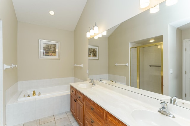 1954 Topaz Pointe Ln SW, Rochester, MN 55902 - full bathroom featuring a garden tub, double vanity, tile patterned flooring, and a shower stall