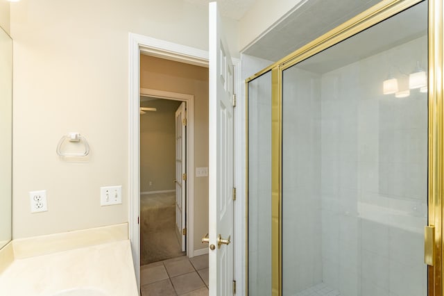 1954 Topaz Pointe Ln SW, Rochester, MN 55902 - bathroom with a stall shower, tile patterned floors, and vanity