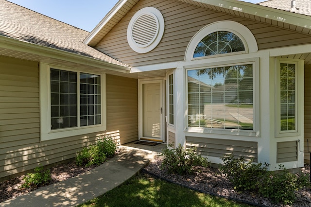 1954 Topaz Pointe Ln SW, Rochester, MN 55902 - view of exterior entry with a shingled roof