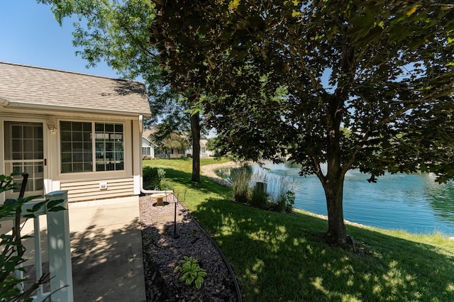1954 Topaz Pointe Ln SW, Rochester, MN 55902 - view of green lawn with a water view