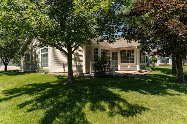 1954 Topaz Pointe Ln SW, Rochester, MN 55902 - view of front facade with a front yard and a patio
