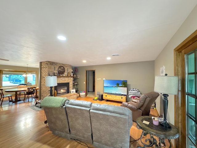 3033 Redwood Ave, Slayton, MN 56172 - living area with wood finished floors, a fireplace, and recessed lighting