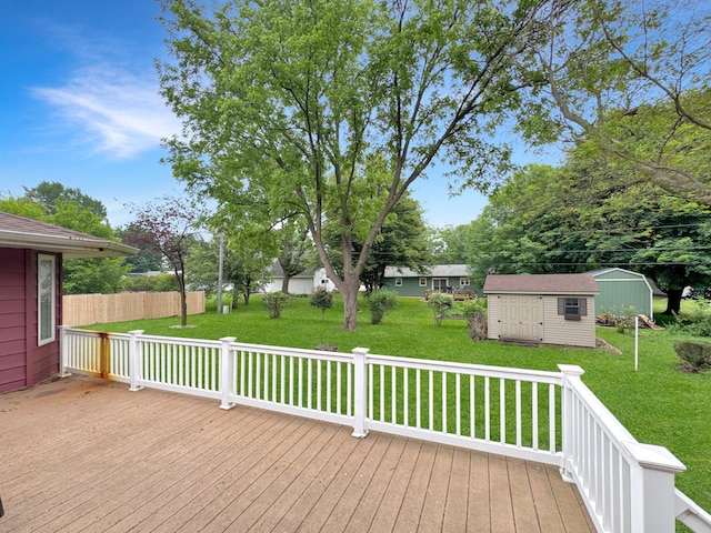 3033 Redwood Ave, Slayton, MN 56172 - deck with a storage shed and a lawn