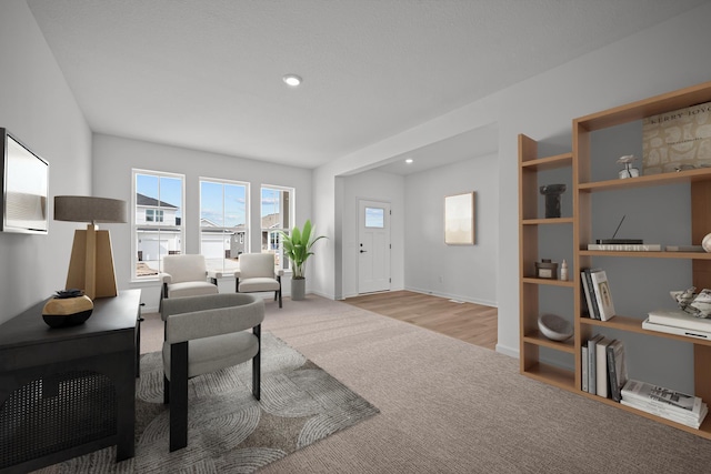TBB Trinity, Shakopee, MN 55379 - living area with carpet floors, recessed lighting, and a desk