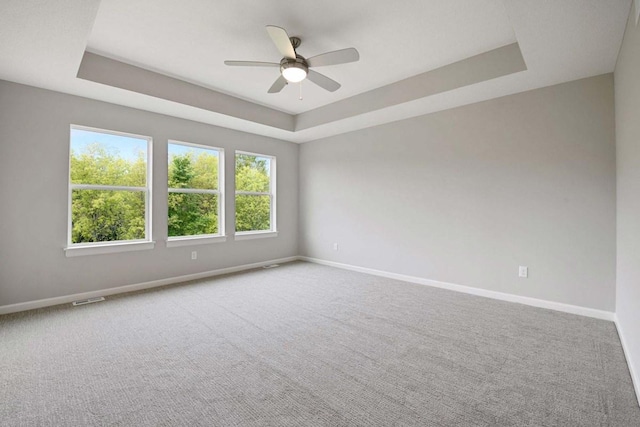 TBB Trinity, Shakopee, MN 55379 - empty room with a raised ceiling, ceiling fan, and carpet floors