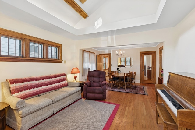 275 Pascal St S, Saint Paul, MN 55105 - living area with a chandelier, beamed ceiling, hardwood / wood-style flooring, and high vaulted ceiling
