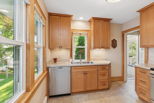 275 Pascal St S, Saint Paul, MN 55105 - kitchen with stainless steel dishwasher, light countertops, and light tile patterned floors