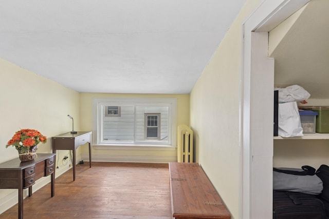 275 Pascal St S, Saint Paul, MN 55105 - sitting room featuring radiator and hardwood / wood-style floors