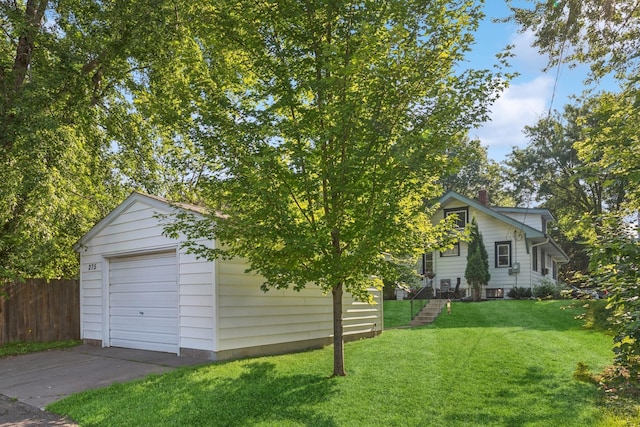 275 Pascal St S, Saint Paul, MN 55105 - exterior space with concrete driveway, an outdoor structure, and a garage