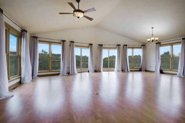 615 18th St, Prairie Lake Twp, WI 54728 - unfurnished room with a chandelier, wood finished floors, ceiling fan, and high vaulted ceiling