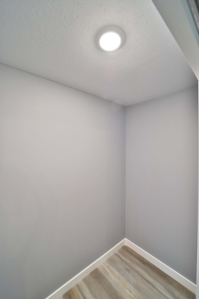 14729 Wildflower Dr, Baxter, MN 56425 - spare room with light wood-style flooring and a textured ceiling