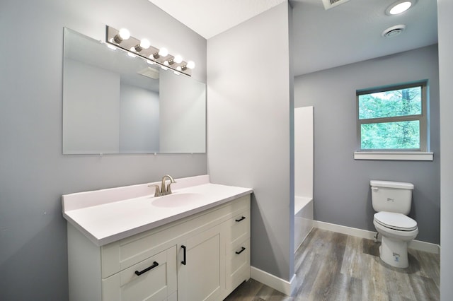 14729 Wildflower Dr, Baxter, MN 56425 - full bathroom featuring vanity, wood finished floors, a bathtub, and a shower