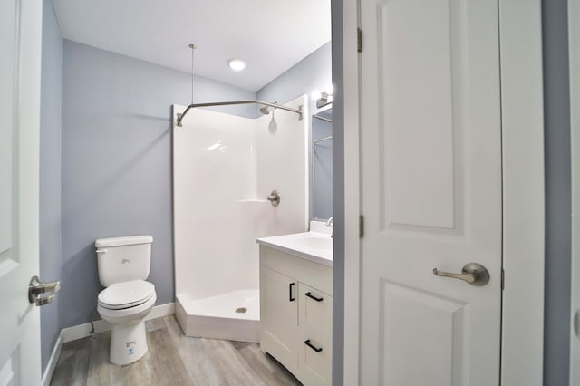 14729 Wildflower Dr, Baxter, MN 56425 - bathroom featuring wood finished floors, vanity, and a stall shower