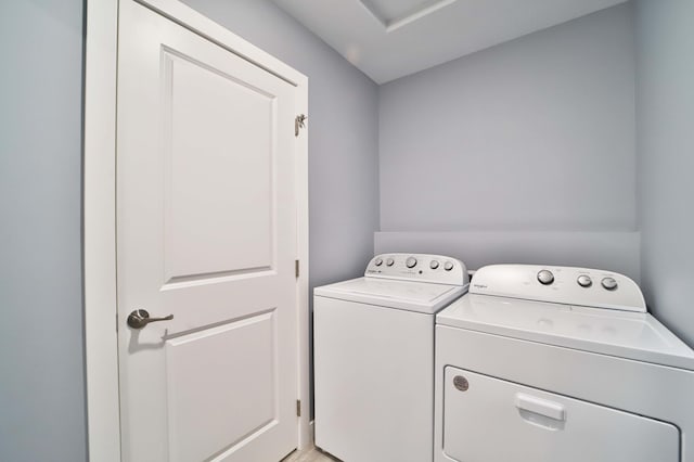 14729 Wildflower Dr, Baxter, MN 56425 - washroom featuring washer and clothes dryer